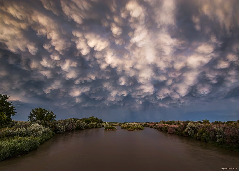 Beautiful sky filled with mammatus clouds over the Arkansas river near Boone, CO.